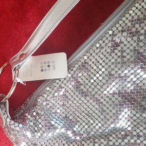 Apt. 9, new silver purse, 14X7 inches